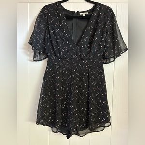 Black chiffon romper with stars